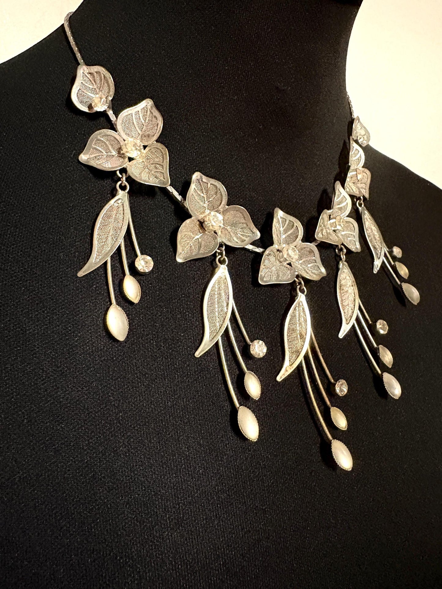 90s vintage extensive statement flower chain necklace. Full breasted array of mesh backed petals and dangling leaves with diamante centres