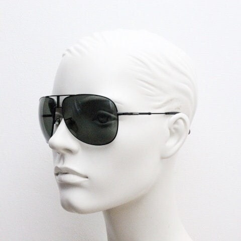 Loewe vintage aviator sunglasses in a tall black gloss frame with dark green lenses. Mens large teardrop pilot aviators. Y2K New Old Stock