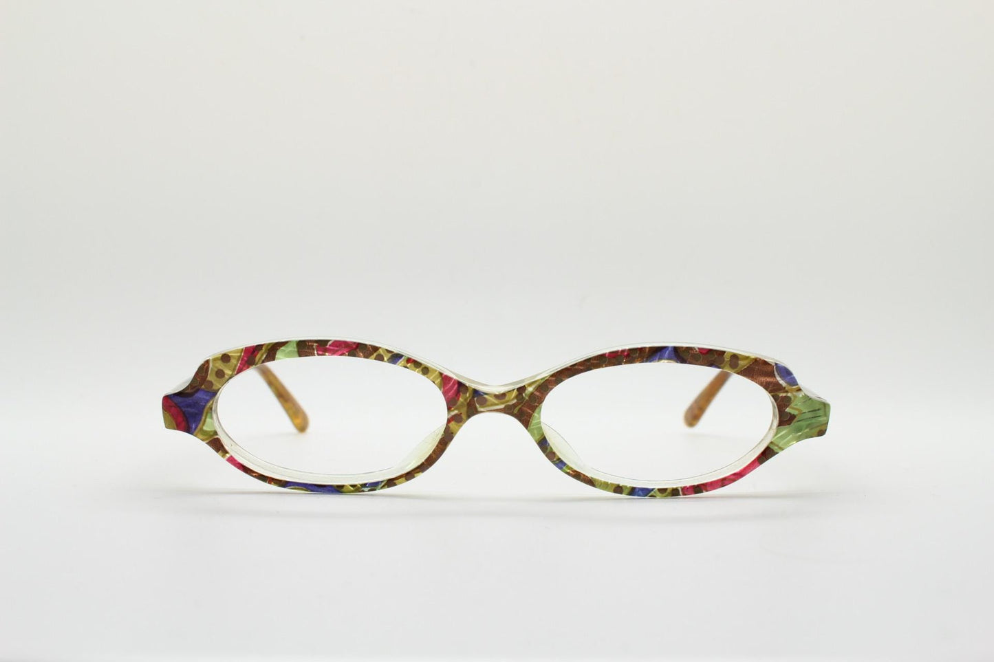 90s vintage small oval eye glasses. Low profile acetate optical frame with extraordinary abstract multi coloured pattern. Prescription RX