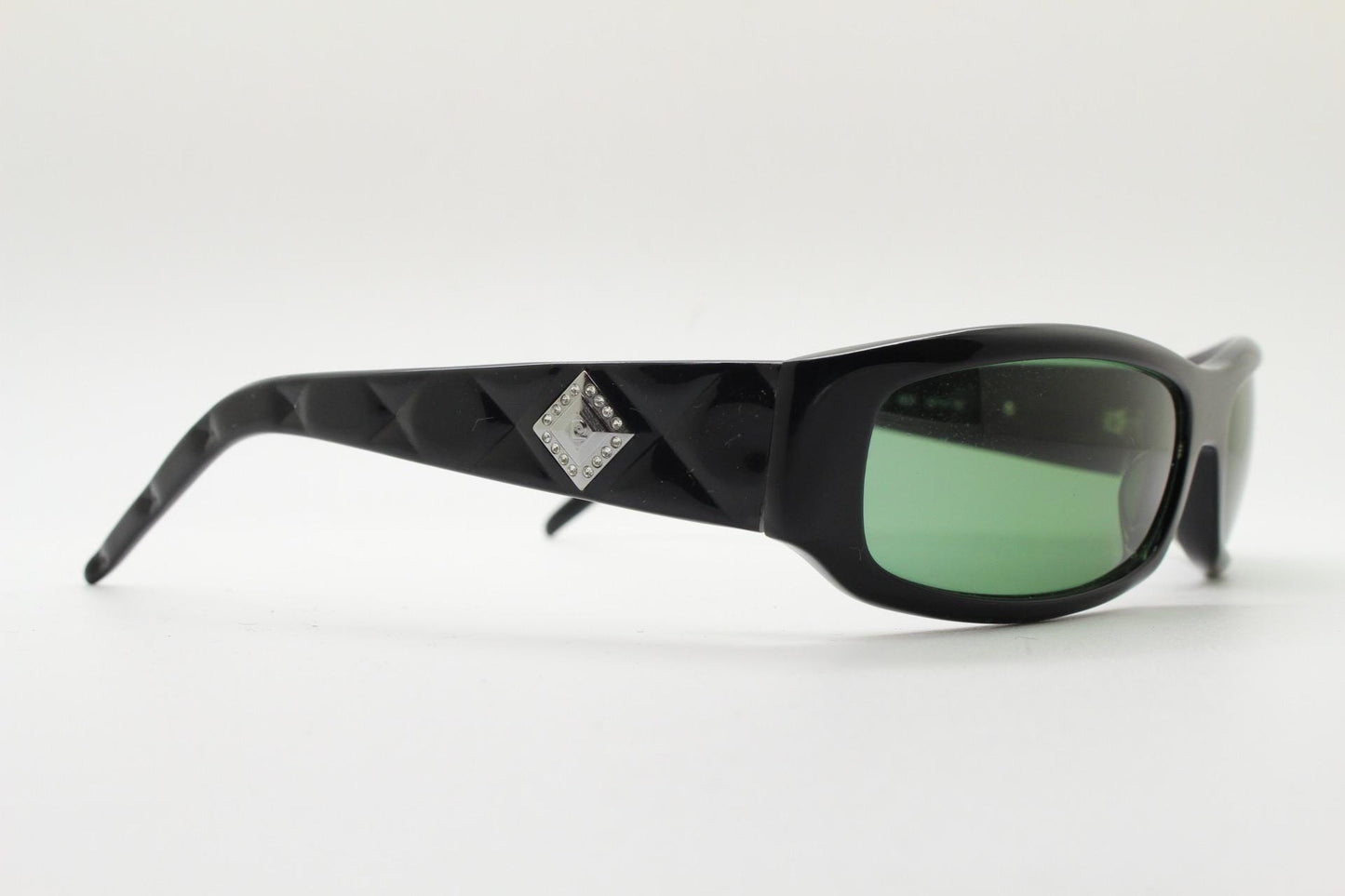 Pierre Cardin vintage 90s wrap around sunglasses made in Italy. Black acetate shield frame with quilted arms and diamante crest. NOS