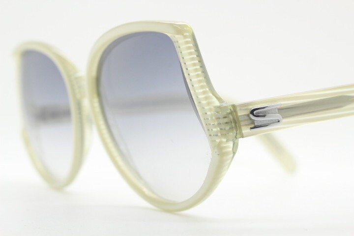 Silhouette 70s vintage abstract upside down sunglasses model 3018 made in Austria. Dynamic grey pearlised acetate frame with white stripes
