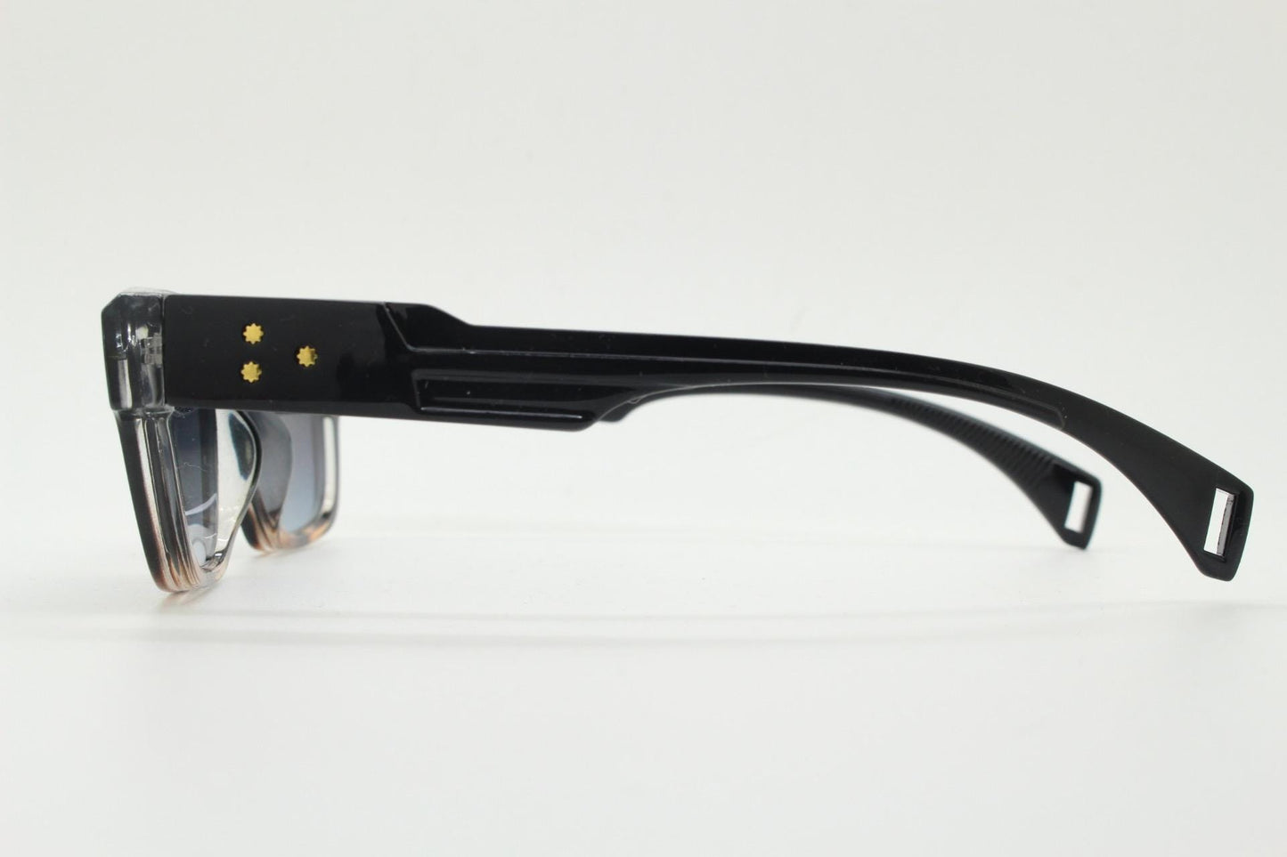 Vintage 90s low profile thick frame sunglasses. Black and tortoise ombre frame with graduating grey lenses. Unused NOS. One off sample