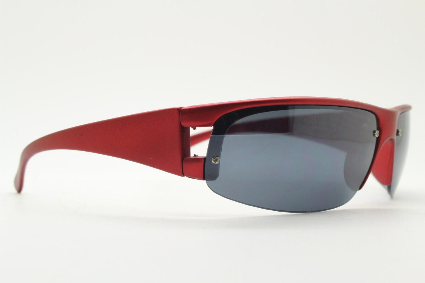 90s vintage visor sunglasses. Red matt metallic curved half frame wrap around sports shield with dark lenses. Mini mask. 2000's. Y2K NOS