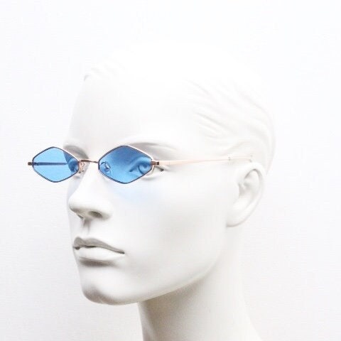 90s vintage small diamond sunglasses. Minimal gold psychedelic mod style frame with sky blue lenses. Unused New Old Stock