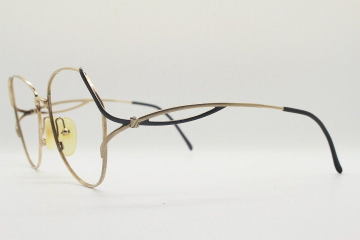 Viennaline 70s vintage angular round eye glasses. Slightly oversized subtle gold chrome optical frame with incredible arms. Prescription RX