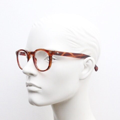 80s vintage modified wayfarer style glasses. Tortoise optical frames with keyhole bridge and clear lenses. 40s, 50s style NOS eyeglasses