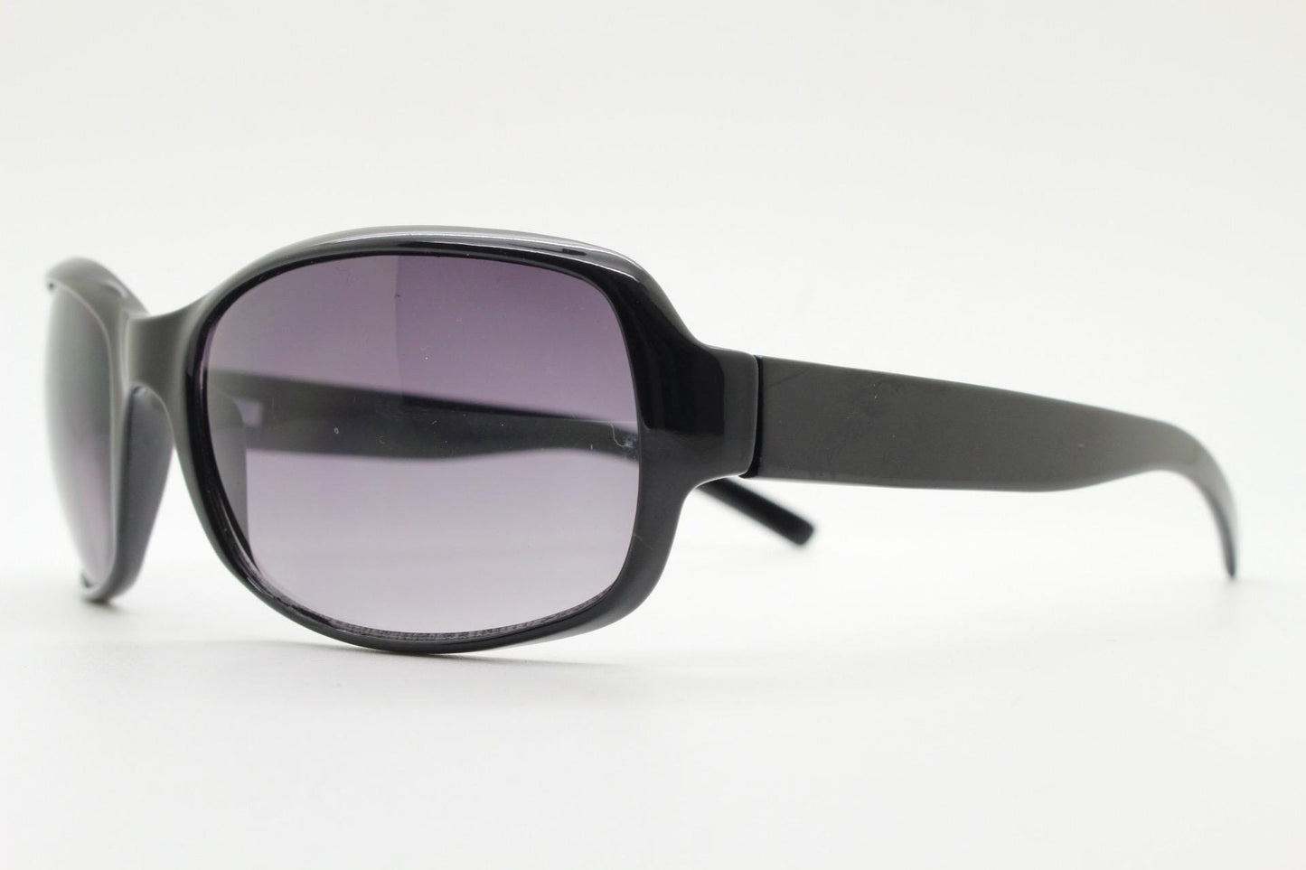 Y2k vintage wrap around rectangular sunglasses. Curved black gloss frame with graduating grey lenses. 2000's bug eye. NOS