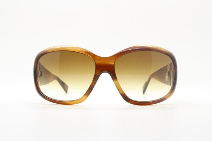 Oliver Peoples vintage Y2K wrap around sunglasses model Vanadis made in Japan. Big bug eye with tall arms in mottled brown acetate frame