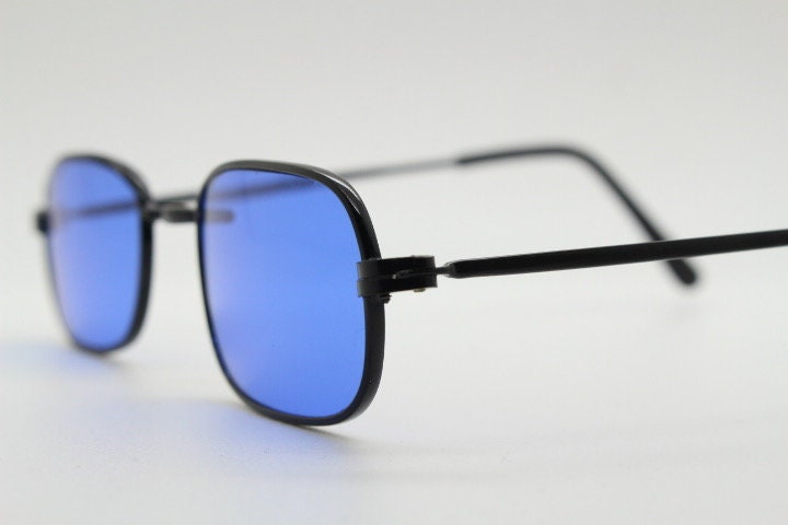90s vintage minimal metal rectangular sunglasses. Small black frame with striking cobalt blue luxury real glass lenses. NOS