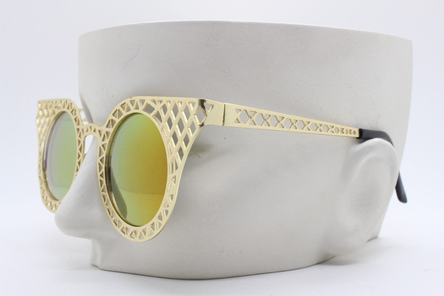 Y2K vintage metal cat eye sunglasses. Women's gold cut out lattice scaffold cateye frame with goldburst mirror lenses. 2000s. BNWT