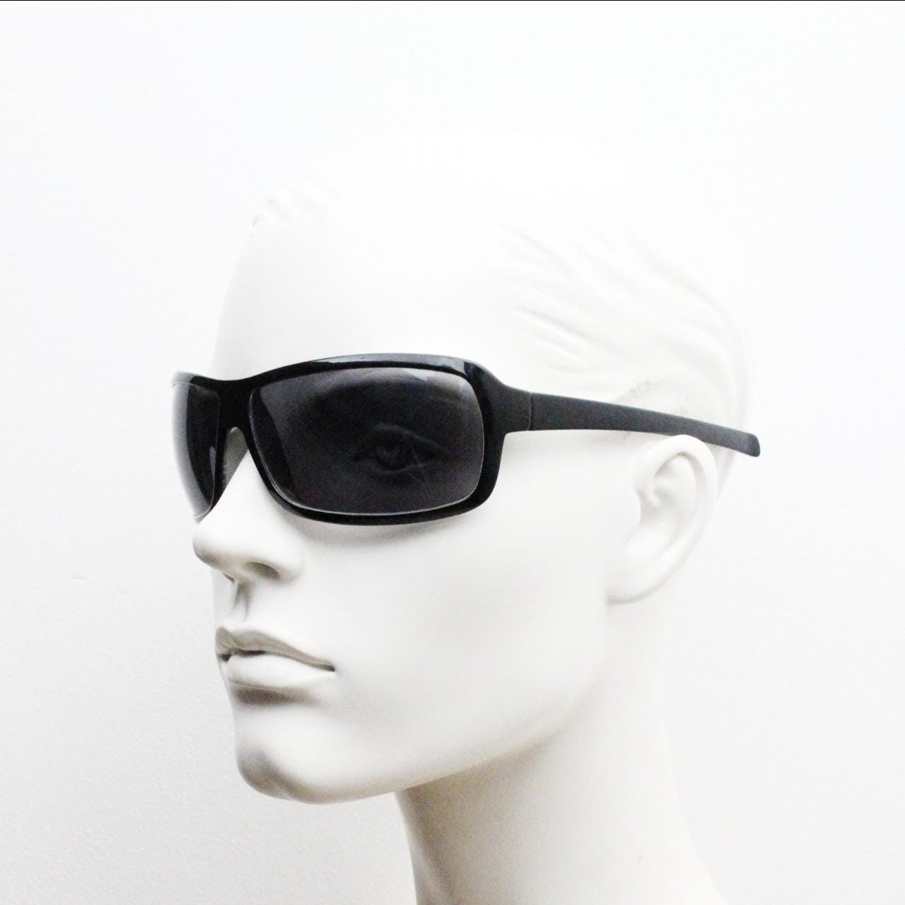 Y2k vintage wrap around large square sunglasses. Curved black shield frame with tasteful striped interior. 1960s bug eye design. 2000's NOS