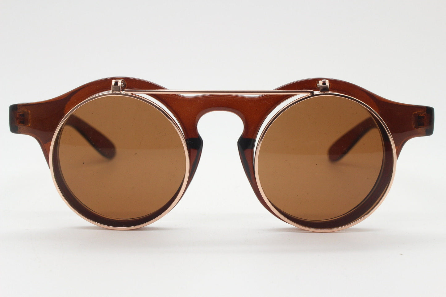 Vintage 90s round flipper sunglasses. 30s style brown frame with clear lenses and flip up sunglasses visor. BNWT unused