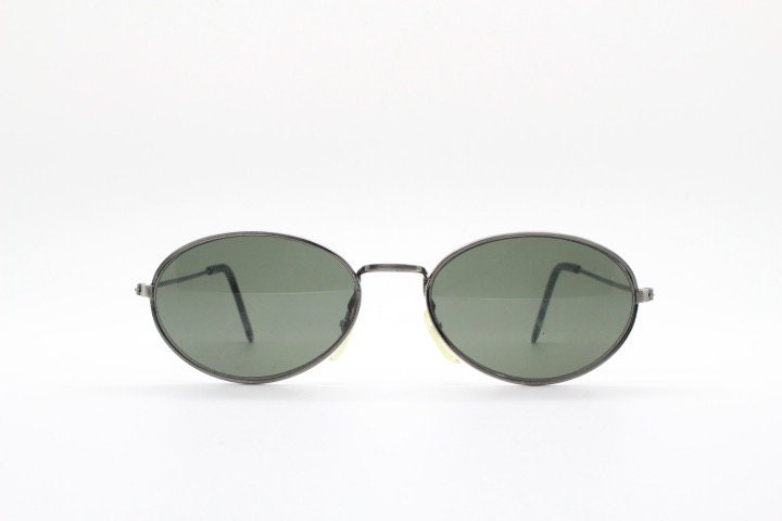 90s vintage metal oval sunglasses. Minimal brushed bronze finish brown frame with plain green lenses. Steampunk. Unused NOS