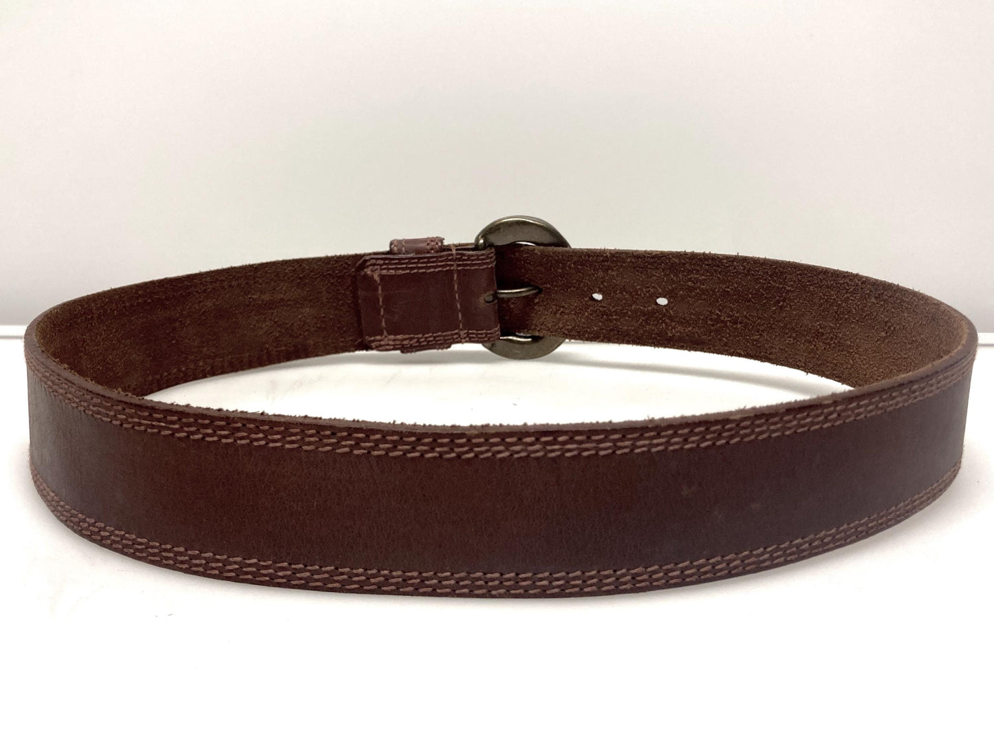 80s vintage jeans or trousers belt with brass buckle. Tan brown substantial single cut genuine leather construction with triple stitching