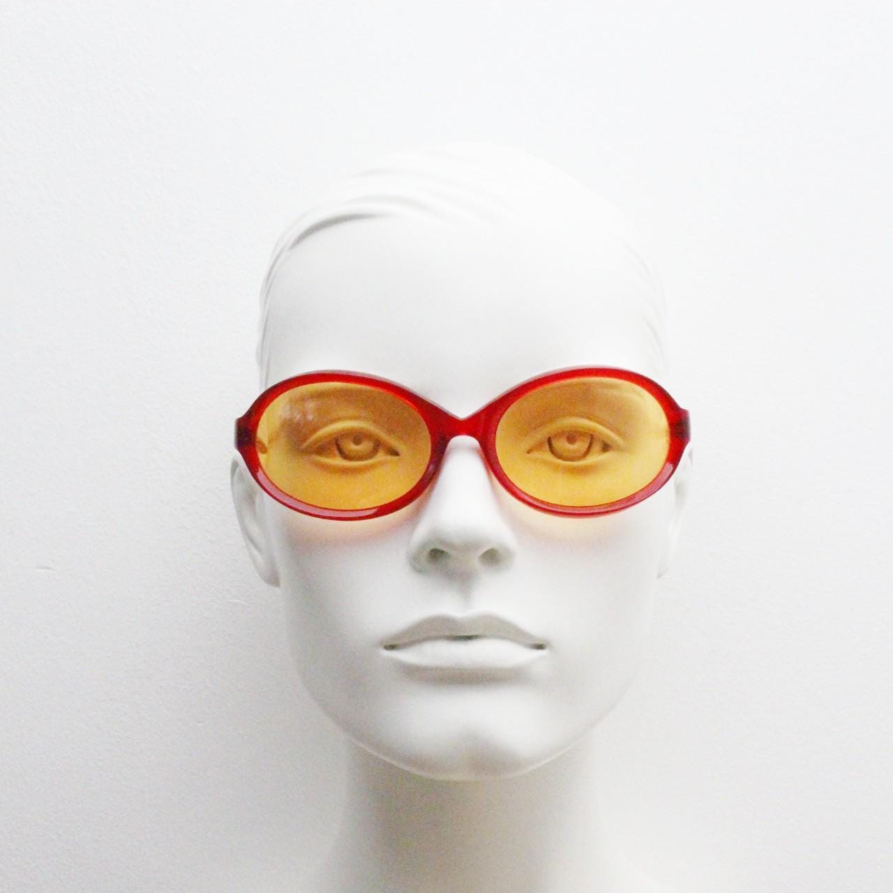 Alain Mikli Y2k vintage mini goggle sunglasses. Red transparent oval curved frame with blazing orange lenses. Definitive 2000s NOS
