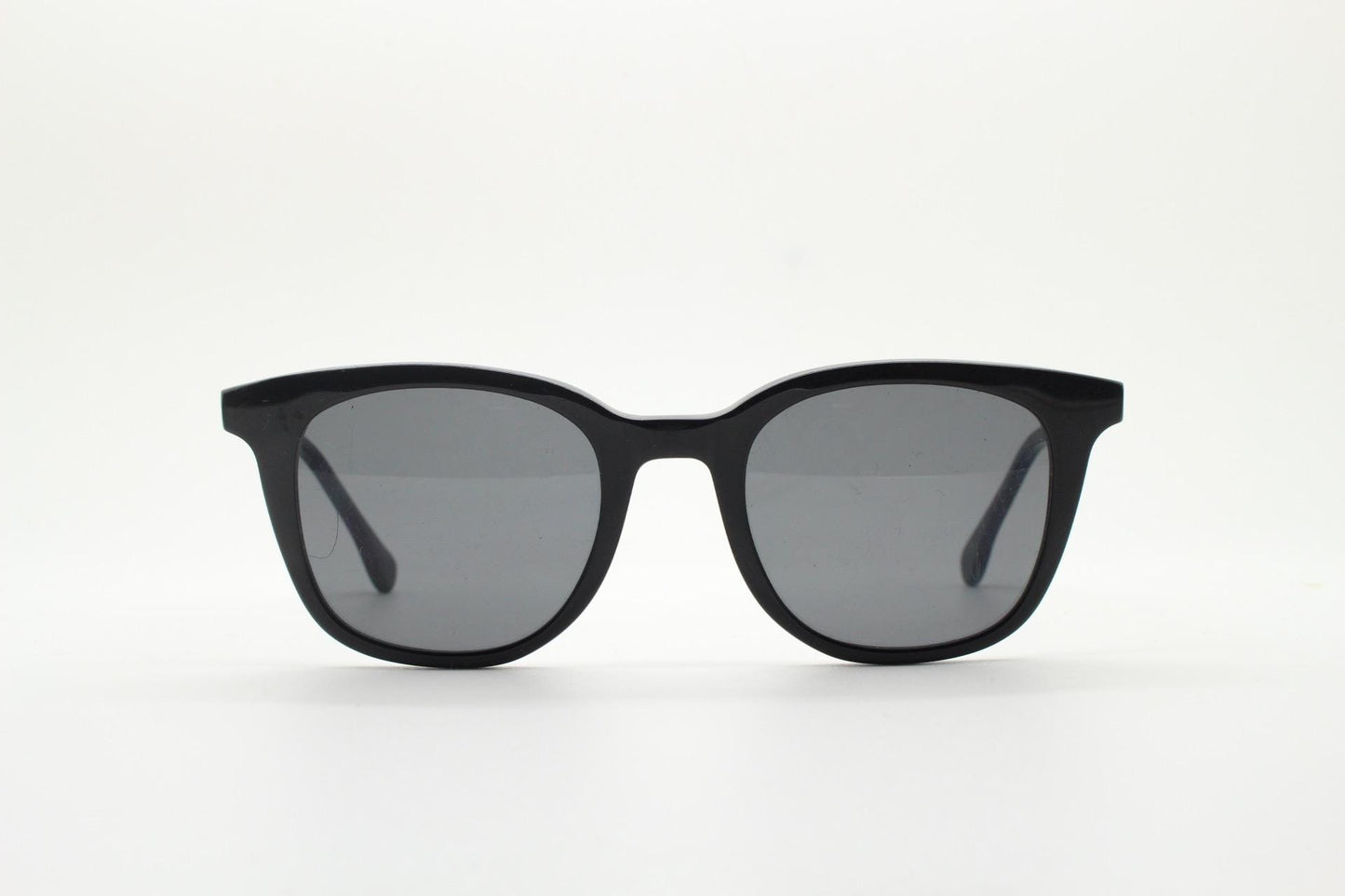 Vintage 90s slim frame black horn rim sunglasses. All time classic retro refined wayfarer design in gloss with black lenses