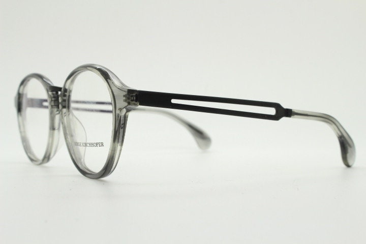 Serge Kirchhofer vintage round titanium eye glasses made in Italy. Transparent grey acetate optical frames. Prescription eyeglasses. RX