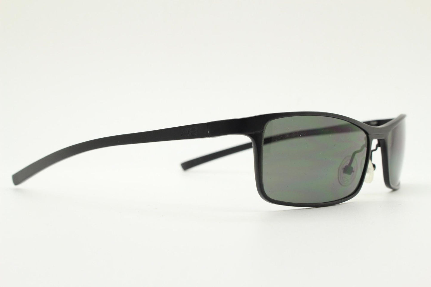 90s vintage sharp rectangular sunglasses by Storm. Minimal matt finish low profile flat top with straightened arms. 60s design. NOS