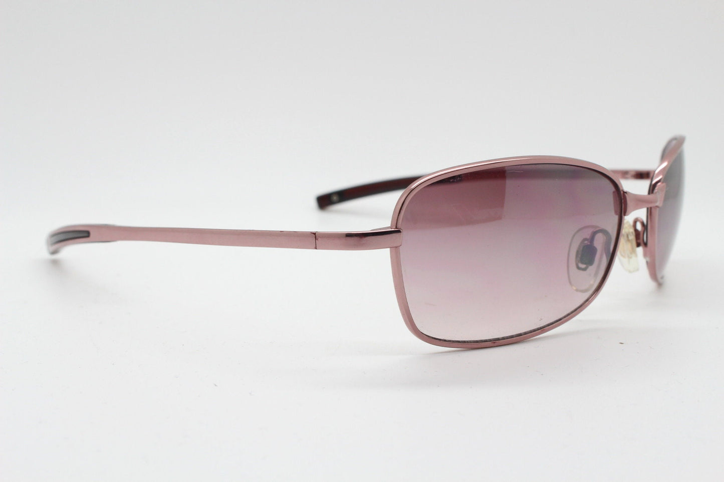 Y2K vintage curved sunglasses. Unusual Pink chrome metal frame with matching flared rectangular lenses. Unused 2000s NOS