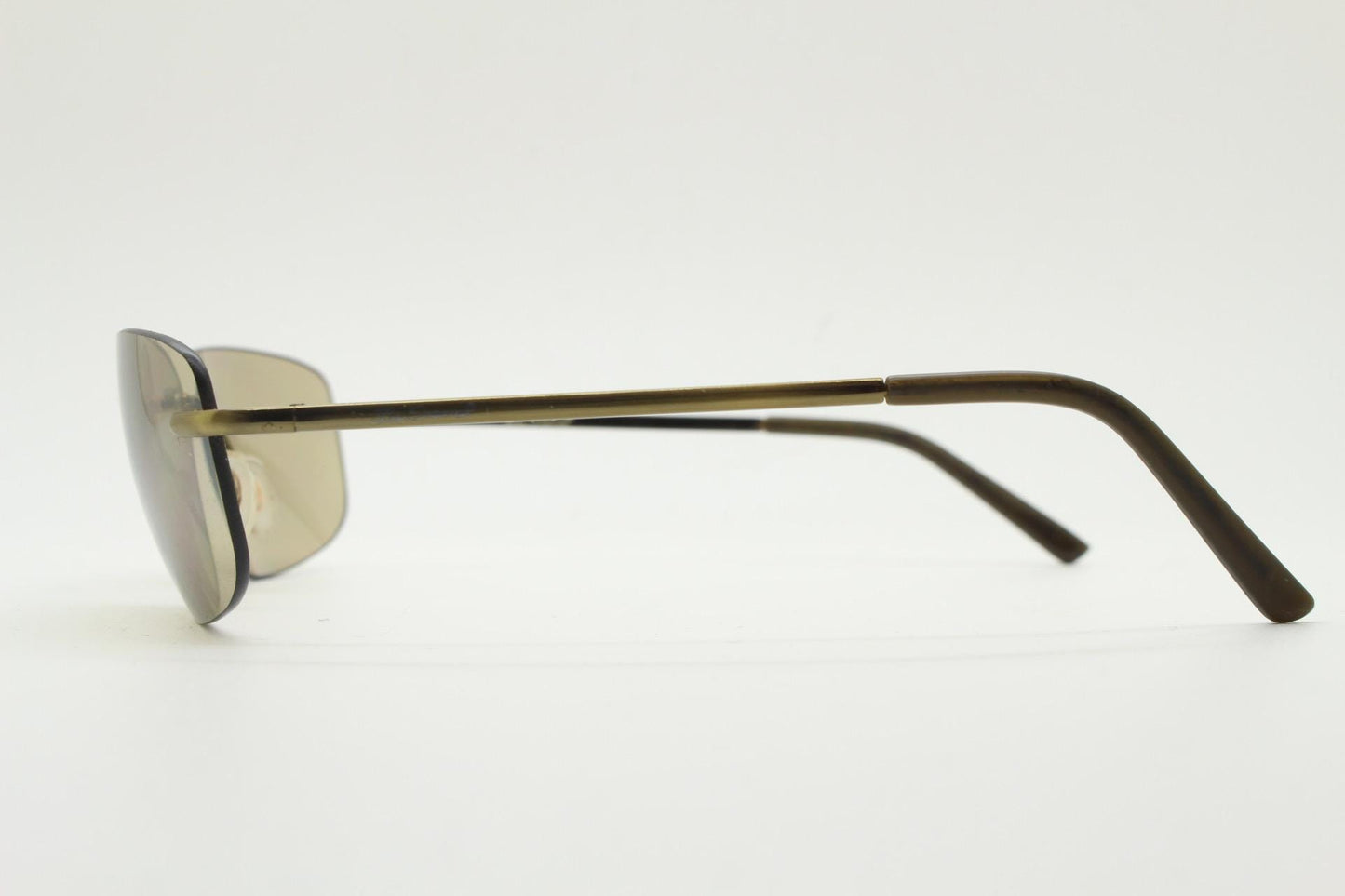 Ben Sherman 90s vintage frameless sunglasses. Minimal brown rectangular lens with brown chrome trim in neat proportions. Mens Mod shades