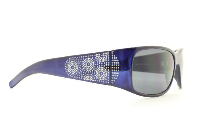Assoluto 90s vintage wrap around rhinestone shield sunglasses made in Italy. Deep blue acetate frame with dazzling diamante circles. NOS