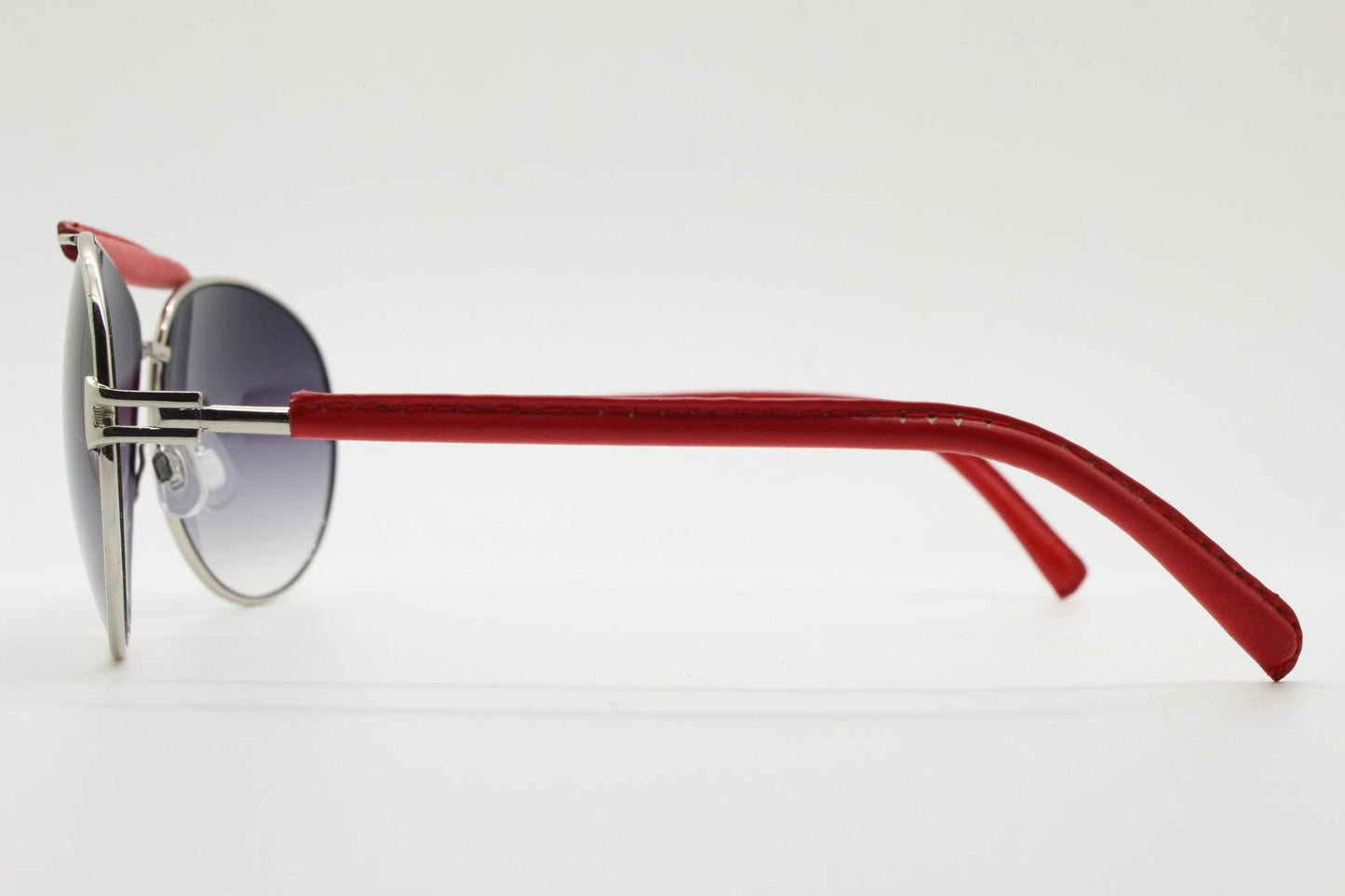 Y2K vintage aviator sunglasses. 2000's silver metal frame with exaggerated bridge in red trim. 70s racing design. 00's NOS aviators