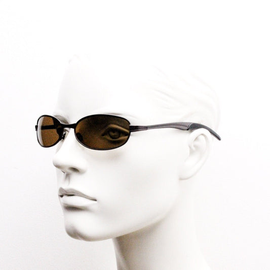 90s vintage oval small bug eye sunglasses. Curved brown satin finish solid metal frame with spear point rubber ends. Steampunk. Quality NOS
