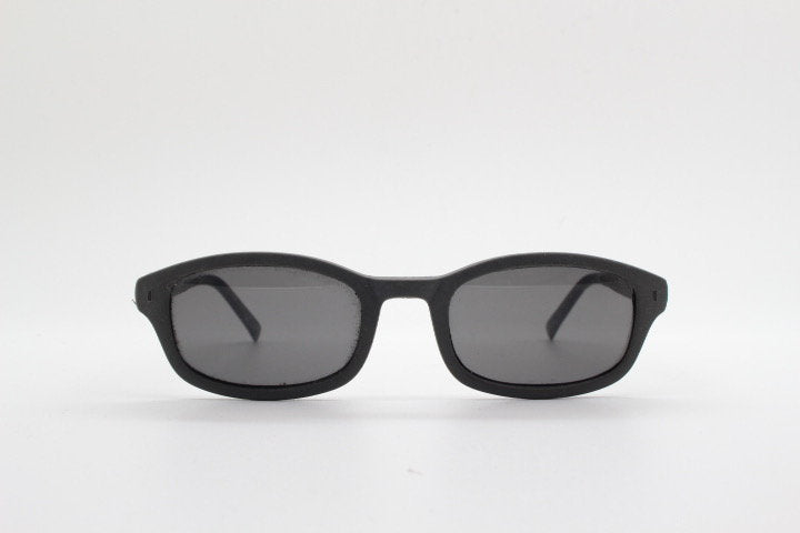 Dolce and Gabbana gum sunglasses made in Italy. Mens 90s vintage innovative flexible grey rubber frame with black lenses
