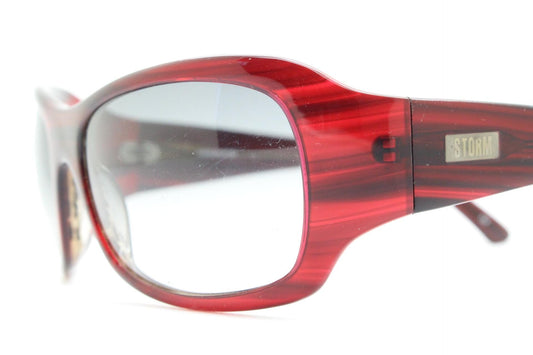 Y2k vintage wrap around large bug eye sunglasses. Curved red acetate shield frame with light tone lenses. 1960s bug eye design. 2000's NOS
