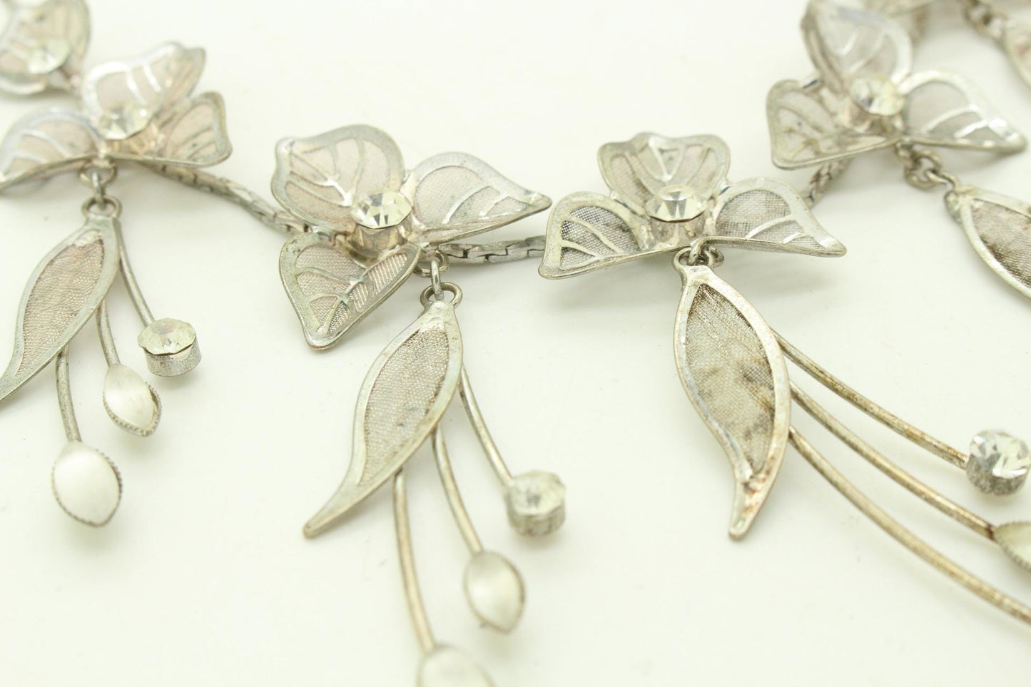 90s vintage extensive statement flower chain necklace. Full breasted array of mesh backed petals and dangling leaves with diamante centres