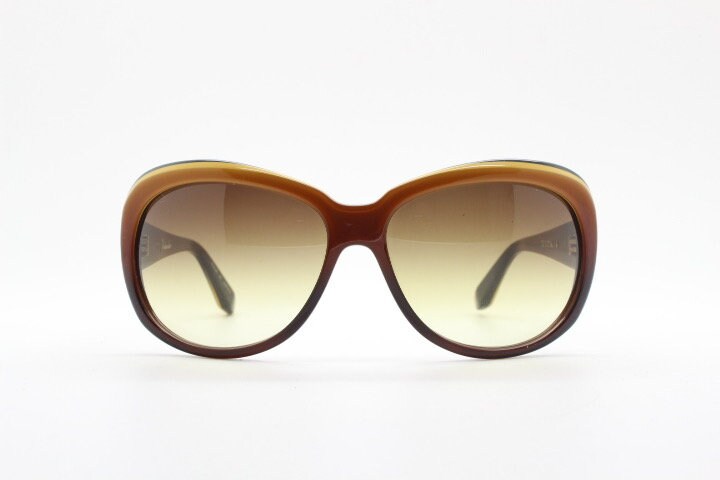 Dita oversized 70s design sunglasses model Pretender made in Japan. Gorgeous brown and black layered acetate. Womens NOS. 60s