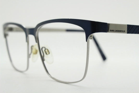Karl Lagerfeld squared wayfarer shape eye glasses. Navy check pattern arms with satin finish brow optical frames. Prescription eyeglasses.