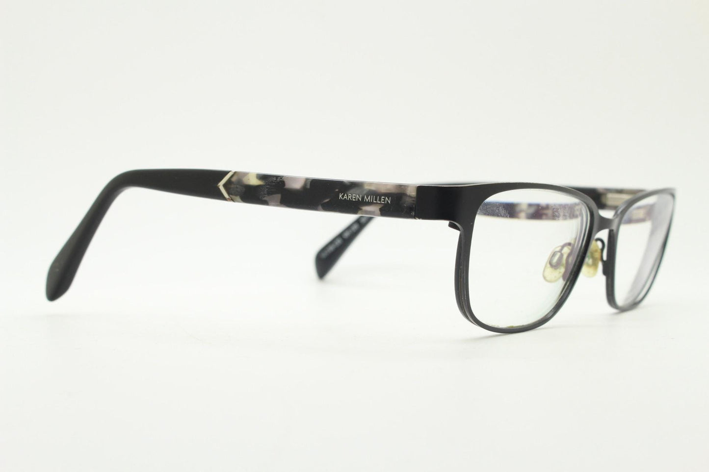 Karen Millen vintage rectangular cat eye glasses. Black satin finish metal front with grey marbled arms. Optical frames. Womens prescription