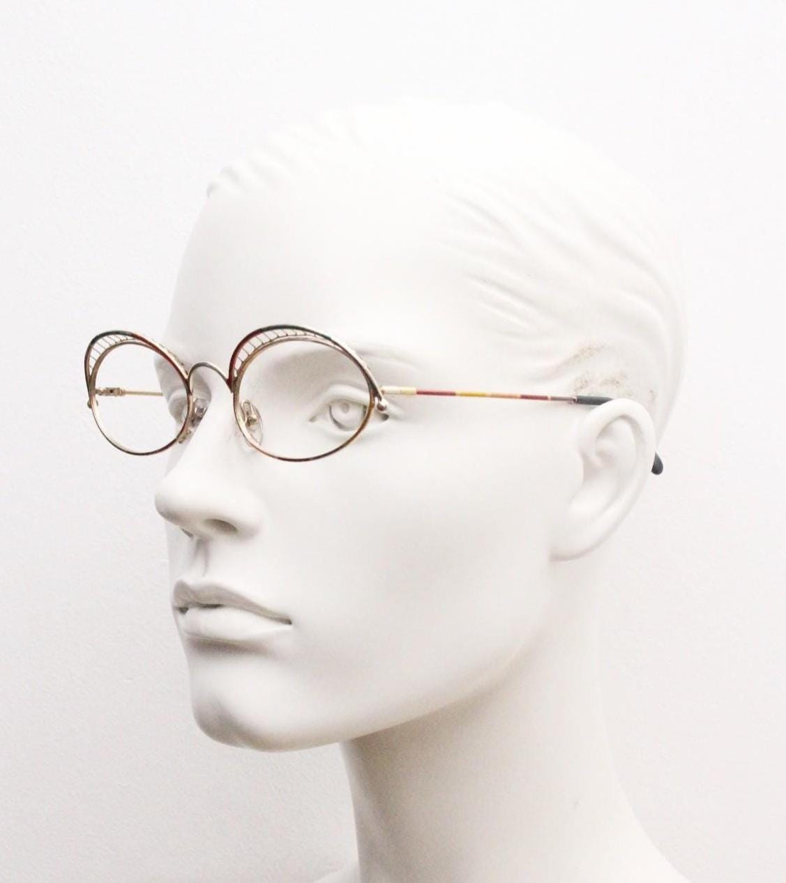 Casanova 80s vintage oval eye glasses. Incredible eyebrow canopy design with multi coloured finish. Optical frames. Prescription spectacles