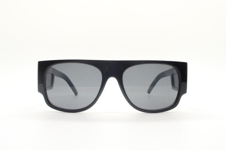 Y2K vintage rectangular side panel sunglasses. Black gloss frame with grey lenses and side window spoilers / blinkers. 2000s NOS goggle