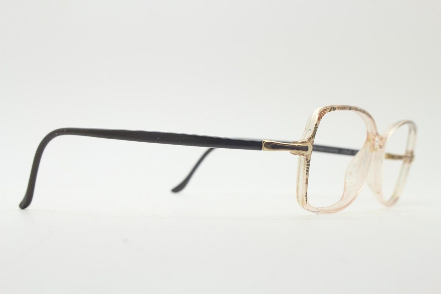 Silhouette 80s vintage oval eye glasses made in Austria. Transparent crystal optical frame with giraffe arm print. Prescription RX