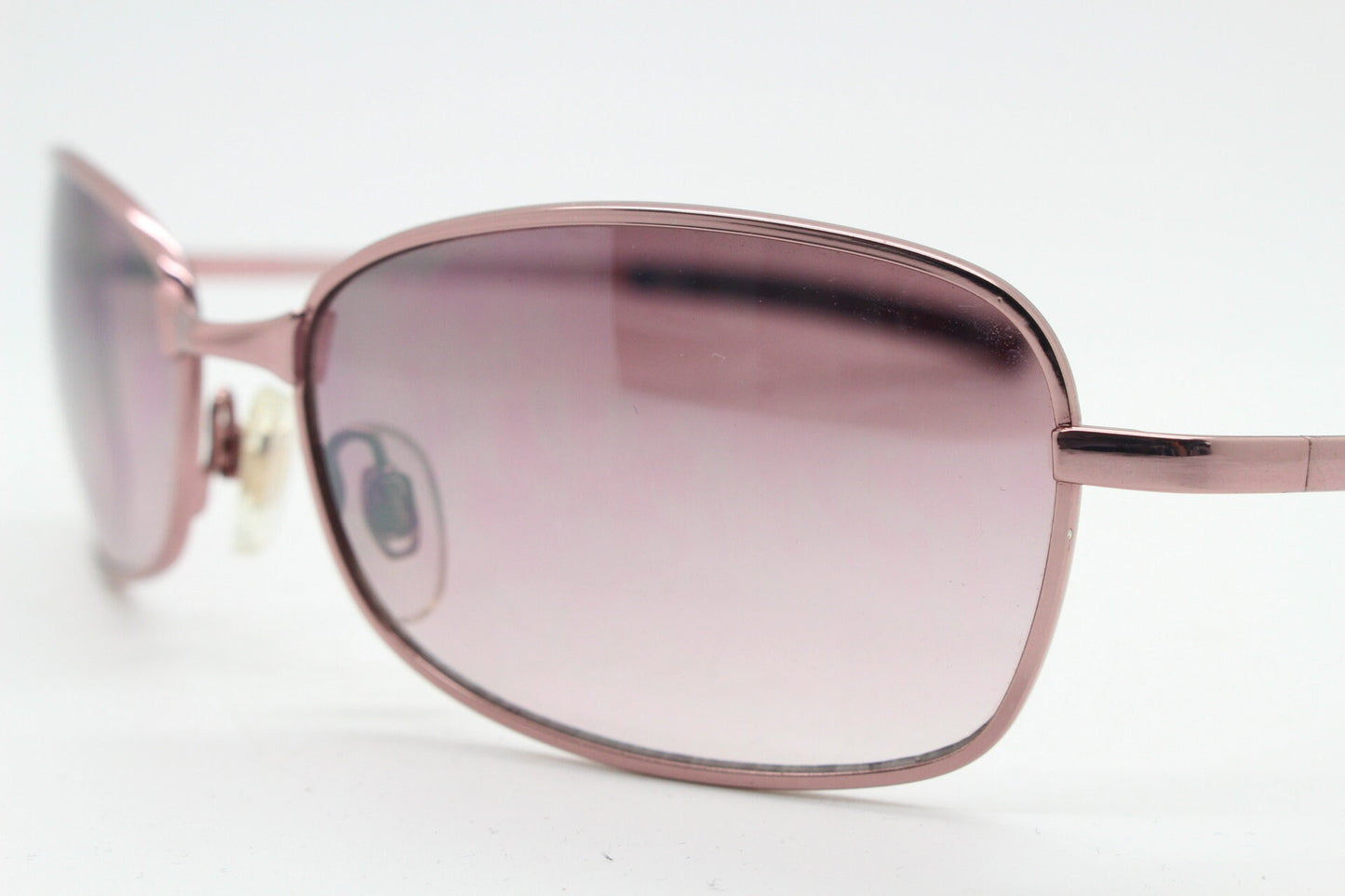 Y2K vintage curved sunglasses. Unusual Pink chrome metal frame with matching flared rectangular lenses. Unused 2000s NOS