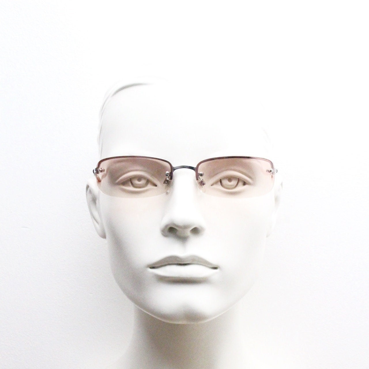 Y2K vintage wrap around rectangular sunglasses. Half frame in sharp chrome with extra light tone pink lenses. Rave 2000's. 00's NOS