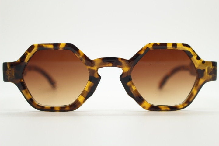 90s vintage hexagon sunglasses. 6 sided honey tortoise gloss chunky frame with graduating Havana brown lens tone. NOS