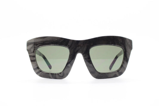 Cheap Monday thick frame cateye sunglasses. Womens chunky oversized grey and black marble cat eye with dark green lenses. Y2k vintage