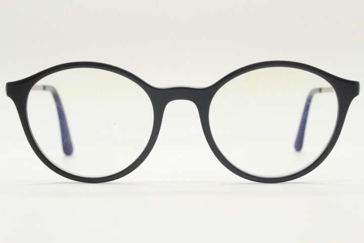 Vogue womens oval eye glasses model 5223. Black acetate optical frames with metal arms. Prescription eyeglasses. RX spectacles