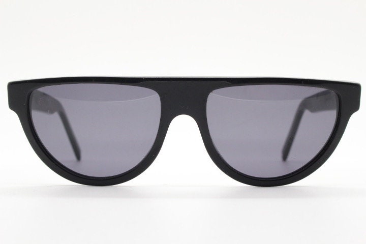 Retrosuperfuture thick flat top cat eye sunglasses hand made in Italy. All black gloss acetate frame. Vintage