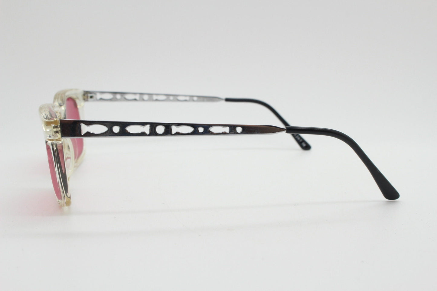 90s vintage futuristic crystal  sunglasses. Rectangular transparent frame with extraordinary arm cut outs and shocking pink lenses. NOS