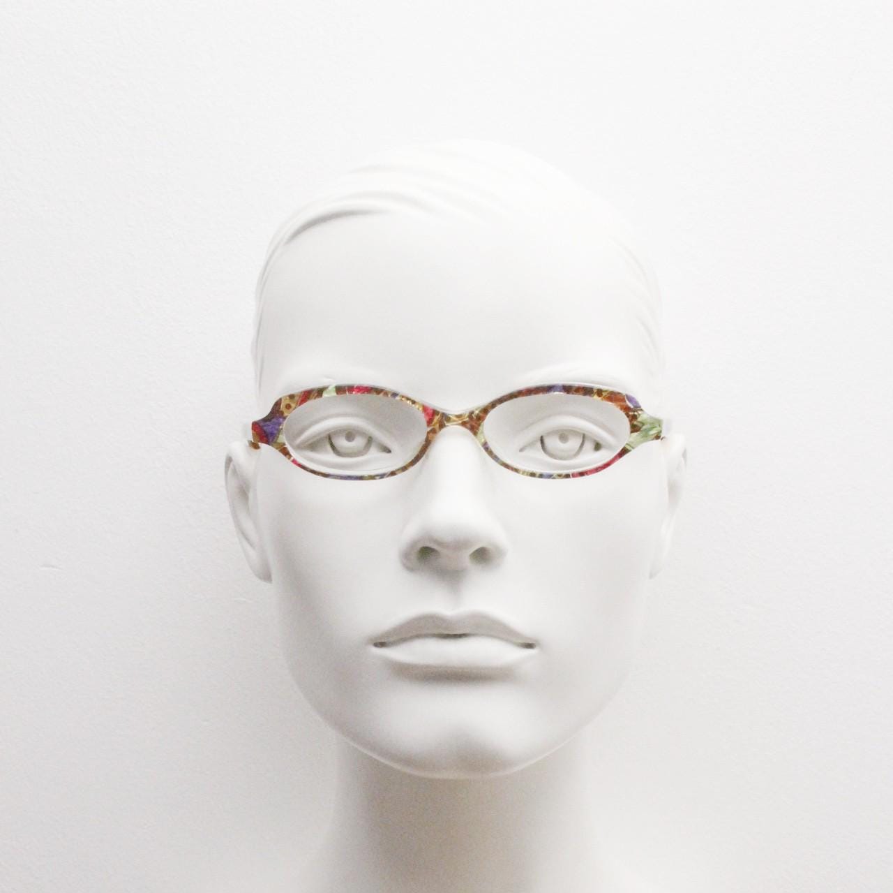 90s vintage small oval eye glasses. Low profile acetate optical frame with extraordinary abstract multi coloured pattern. Prescription RX