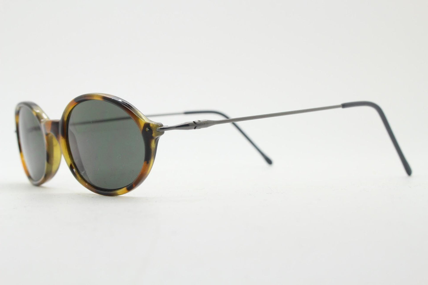 90s vintage oval sunglasses. Honey tortoise frame with refined slim 'industrial tech' style arms. Micro. Unused NOS