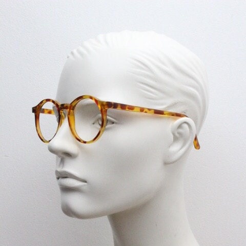 90s vintage round glasses. 30s, 40s design optical frames in a vibrant honey tortoise finish. Prescription eyeglasses. Spectacles.O Malley