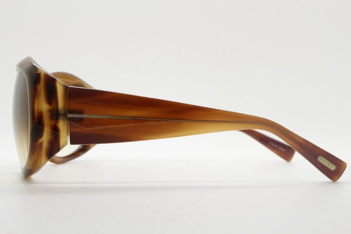 Oliver Peoples vintage Y2K wrap around sunglasses model Vanadis made in Japan. Big bug eye with tall arms in mottled brown acetate frame