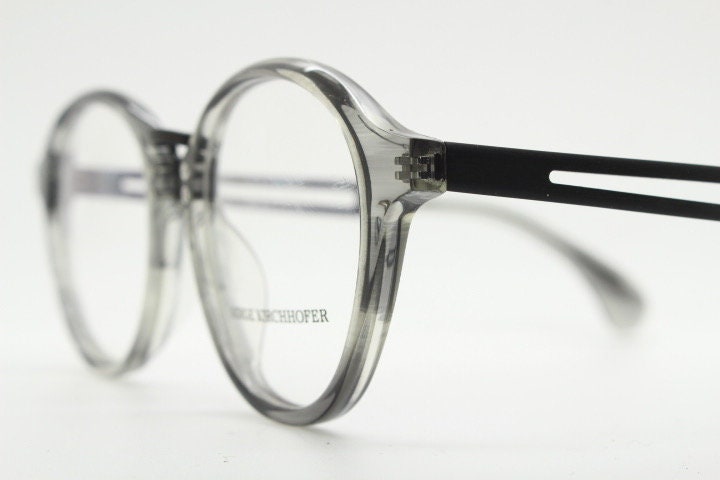Serge Kirchhofer vintage round titanium eye glasses made in Italy. Transparent grey acetate optical frames. Prescription eyeglasses. RX