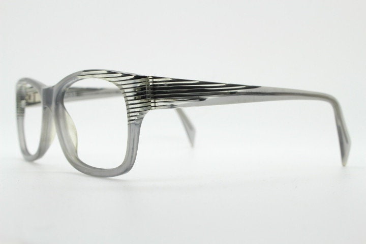 Alain Mikli rectangular eye glasses made in France. Dynamic black and white striped layered acetate grey optical frame. Prescription RX