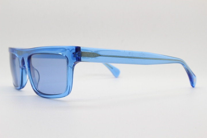 Kaleos rectangular flat top sunglasses. Bright sky blue acetate chunky frame with same colour lenses. BNWOT